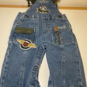6-9 months Blue denim overalls with embroidered patches and zipper pockets